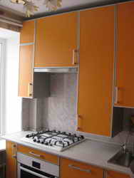 Кухня на заказ с фасадами из Пластик в профиле  Оранжевый матовый